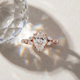 Rose gold Pear Cut Diamond Solitaire Ring with Side Stones and Four-Prong Setting_16