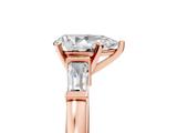 Rose gold Pear Cut Diamond Solitaire Ring with Tapered Baguette Accents and Six-Prong Setting_79
