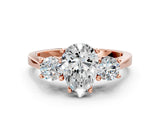 Rose gold Pear Cut Diamond Three-Stone Engagement Ring with Prong Setting and Pavé Band_3