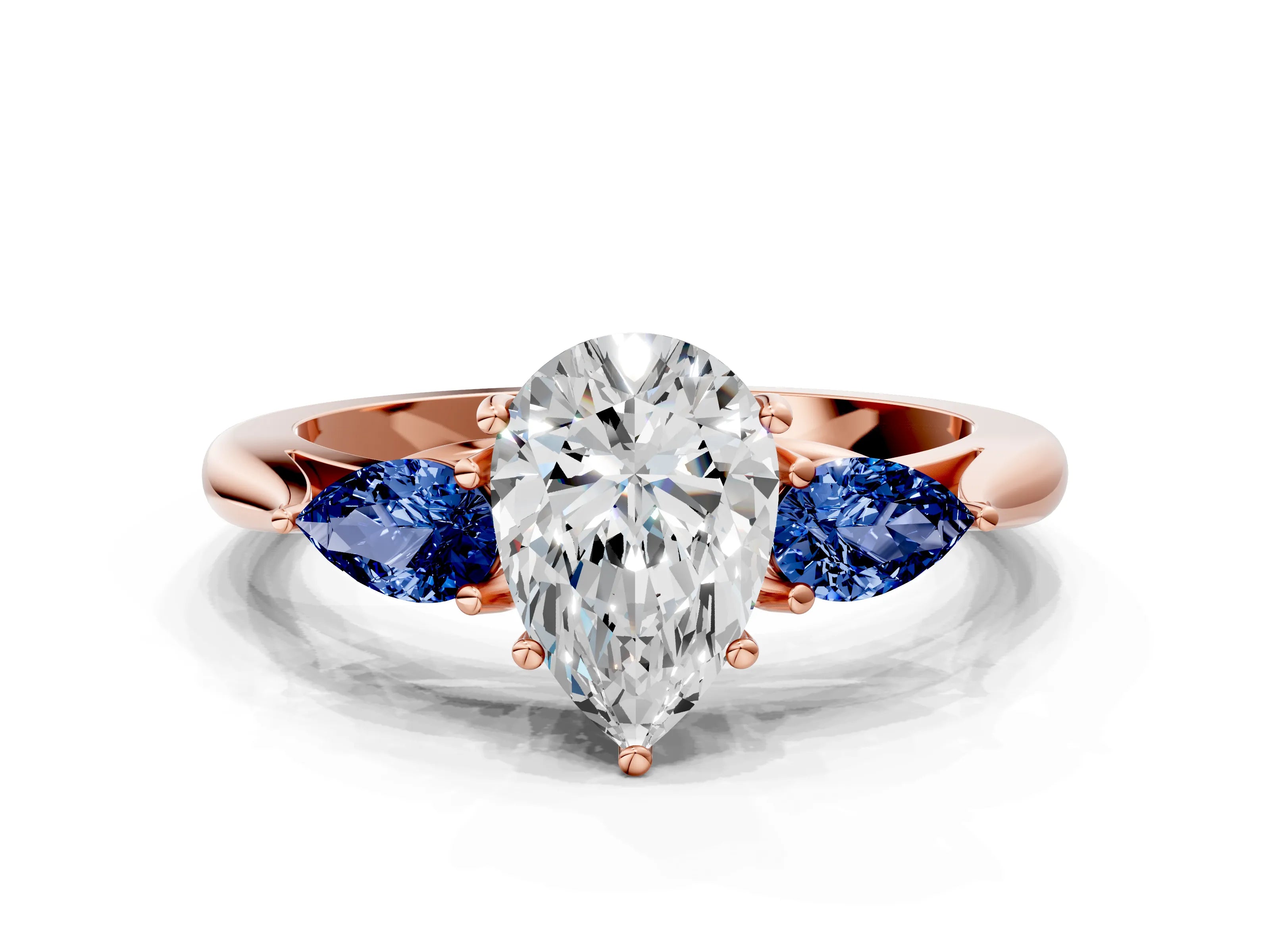 Rose gold Pear Cut Diamond Three-Stone Ring with Pear with Blue Sapphire side stone Side Stones and Prong Setting