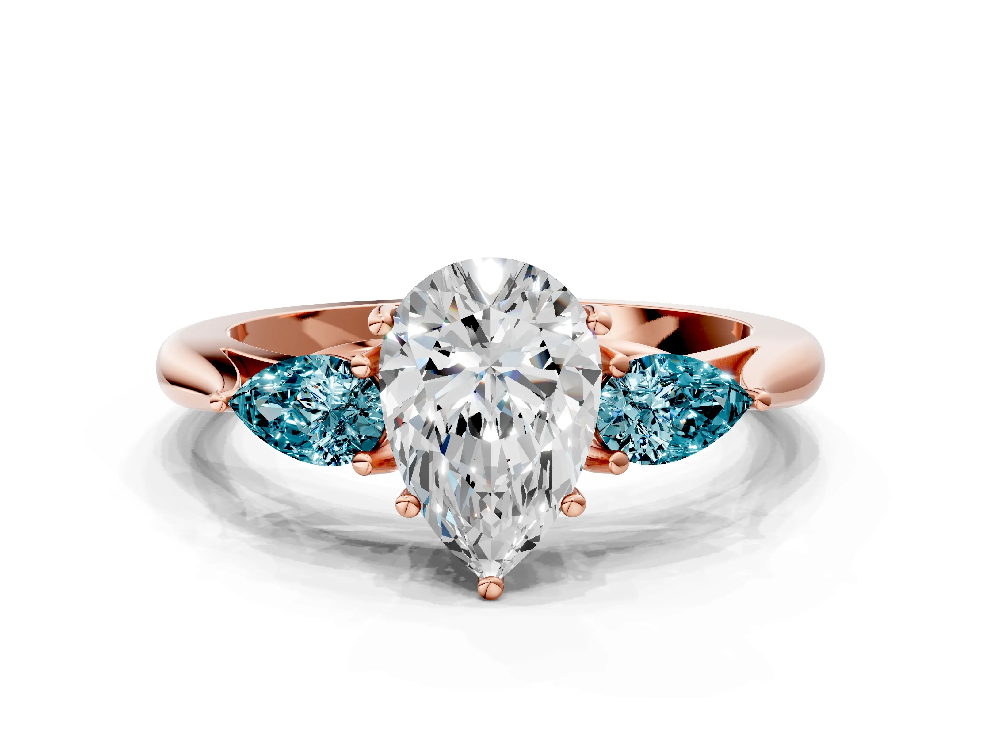 Rose gold Pear Cut Diamond Three-Stone Ring with Pear with Blue Topaz side stone Side Stones and Prong Setting