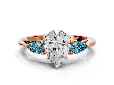 Rose gold Pear Cut Diamond Three-Stone Ring with Pear with Blue Topaz side stone Side Stones and Prong Setting