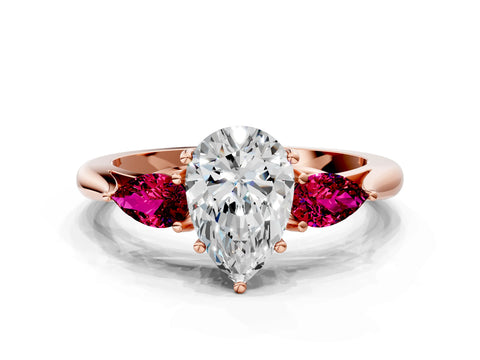 Rose gold Pear Cut Diamond Three-Stone Ring with Pear with Garnet side stone Side Stones and Prong Setting