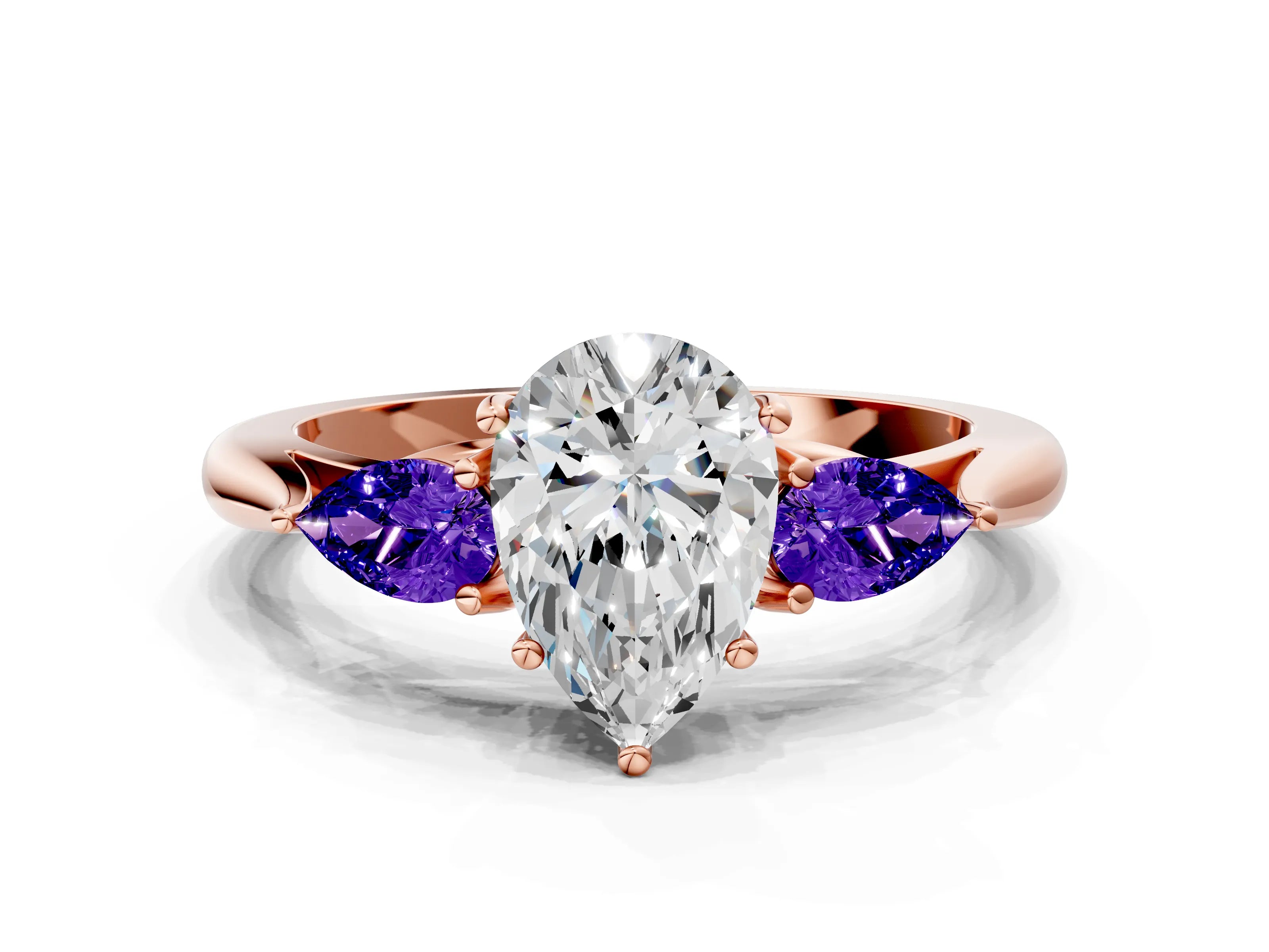 Rose gold Pear Cut Diamond Three-Stone Ring with Pear with Tanzanite side stone Side Stones and Prong Setting