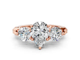 Rose gold Pear Cut Diamond Three-Stone Ring with Prong Setting and Pavé Band_3
