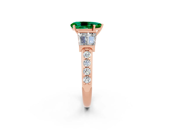 Rose gold Pear Cut Emerald Engagement Ring with Baguette Side Stones and Channel Set Band
