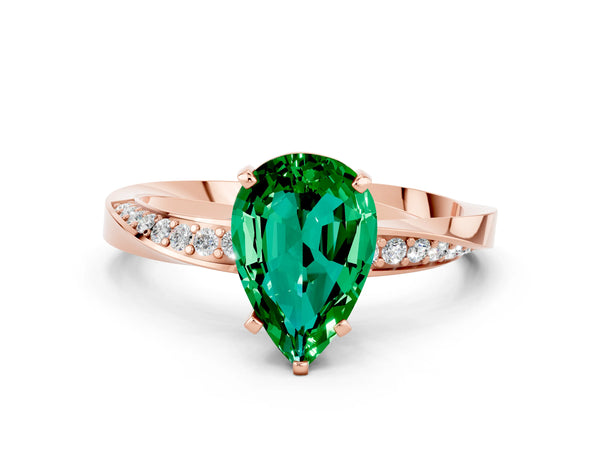 Rose gold Pear Cut Emerald Engagement Ring with Side Stone Accents and Four-Prong Setting