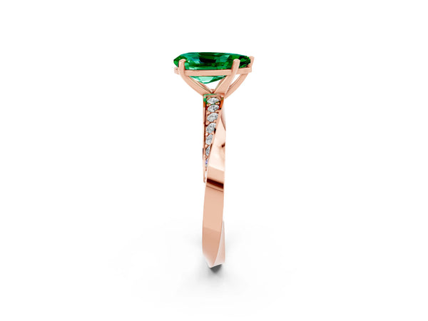 Rose gold Pear Cut Emerald Engagement Ring with Side Stone Accents and Four-Prong Setting