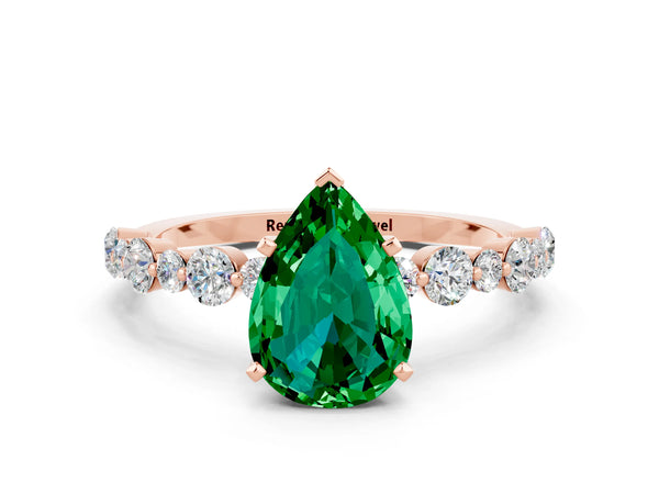 Rose gold Pear Cut Emerald Prong Set Engagement Ring with Pavé Band