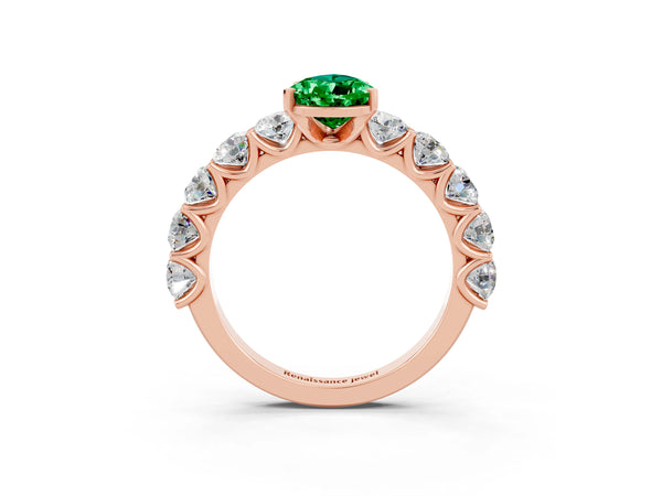 Rose gold Pear Cut Emerald Prong Setting with Side Stones on a Pave Band