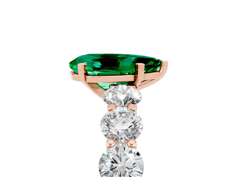 Rose gold Pear Cut Emerald Prong Setting with Side Stones on a Pave Band_5