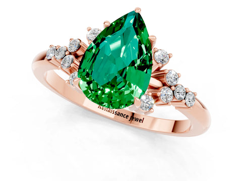 Rose gold Pear Cut Emerald Ring with Side Stones and Four-Prong Setting_37