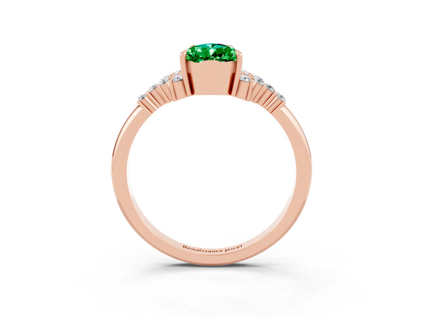 Rose gold Pear Cut Emerald Ring with Side Stones and Four-Prong Setting