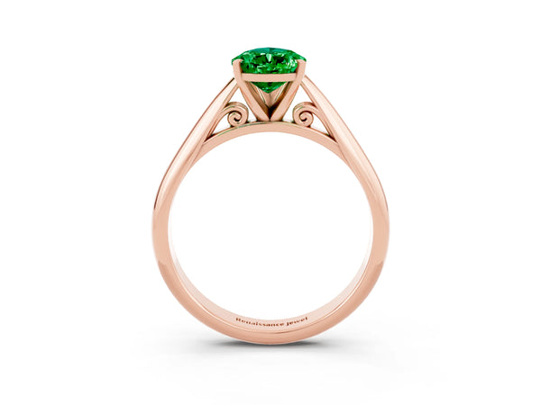 Rose gold Pear Cut Emerald Solitaire Engagement Ring with Cathedral Setting and Four-Prong Mount