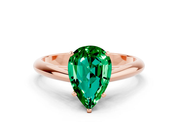 Rose gold Pear Cut Emerald Solitaire Engagement Ring with Cathedral Setting and Four-Prong Mount