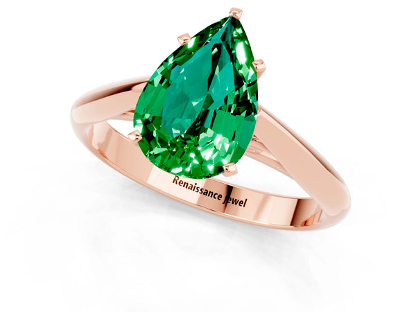 Rose gold Pear Cut Emerald Solitaire Engagement Ring with Cathedral Setting and Four-Prong Mount
