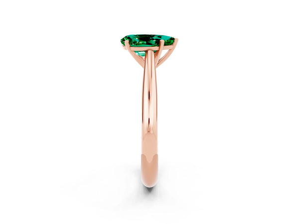 Rose gold Pear Cut Emerald Solitaire Engagement Ring with Cathedral Setting and Four-Prong Mount