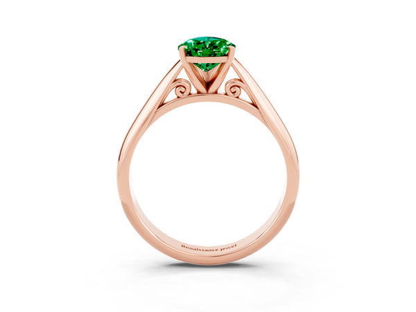 Rose gold Pear Cut Emerald Solitaire Engagement Ring with Cathedral Setting and Four-Prong Mount