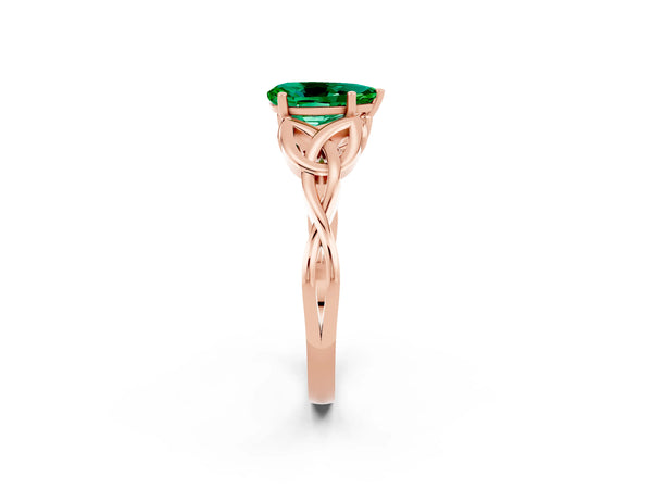 Rose gold Pear Cut Emerald Solitaire Engagement Ring with Celtic Knot Band and Four-Prong Setting