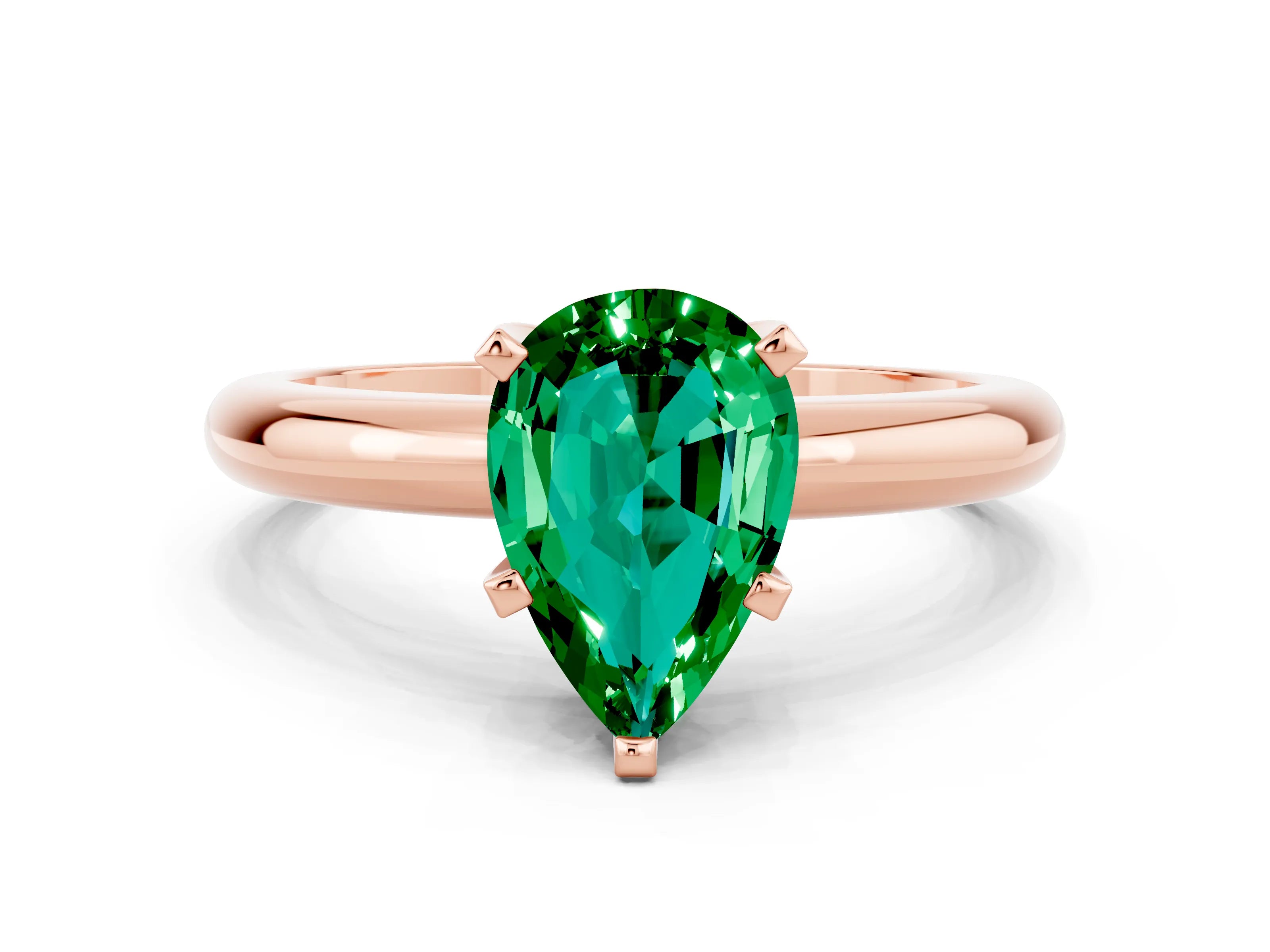 Rose gold Pear Cut Emerald Solitaire Engagement Ring with Round Band and Four-Prong Setting