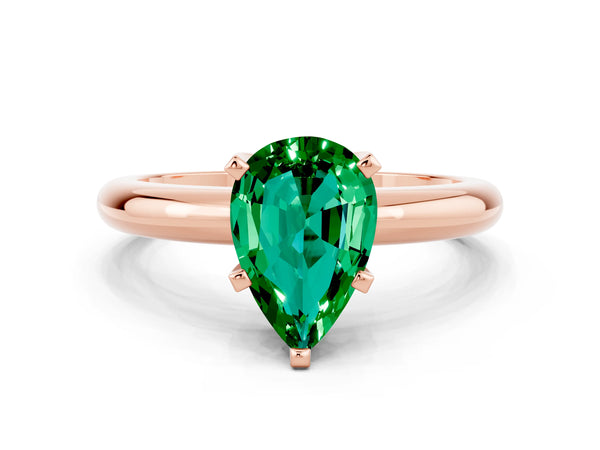 Rose gold Pear Cut Emerald Solitaire Engagement Ring with Round Band and Four-Prong Setting