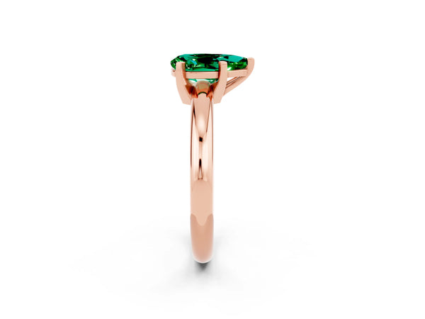 Rose gold Pear Cut Emerald Solitaire Engagement Ring with Round Band and Four-Prong Setting
