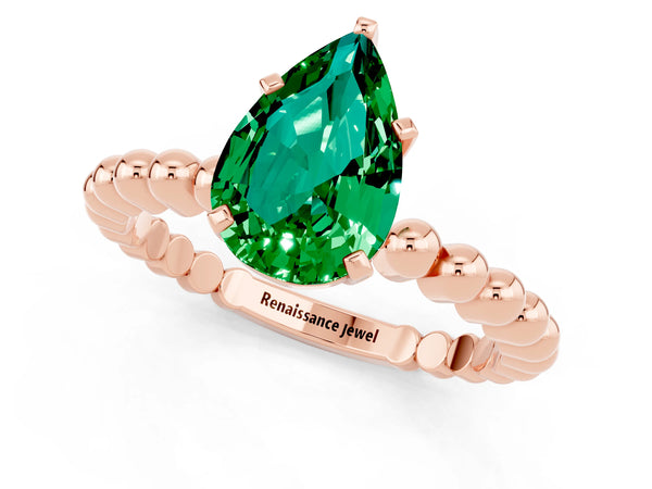 Rose gold Pear Cut Emerald Solitaire Ring with Beaded Band and Prong Setting