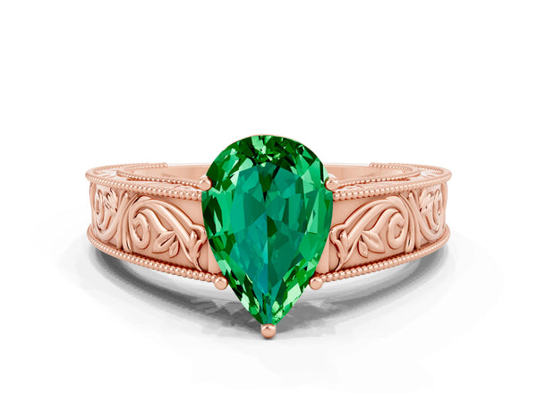 Rose gold Pear Cut Emerald Solitaire Ring with Engraved Band and Four-Prong Setting