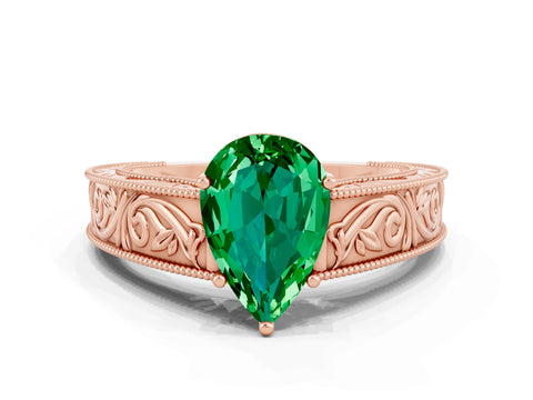 Rose gold Pear Cut Emerald Solitaire Ring with Engraved Band and Four-Prong Setting