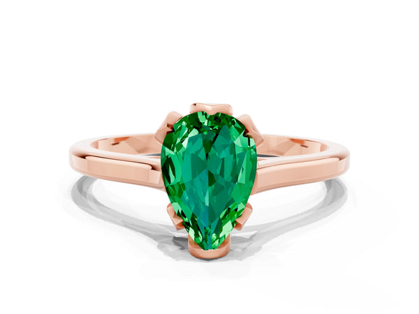 Rose gold Pear Cut Emerald Solitaire Ring with Flower Prong Setting and Classic Band