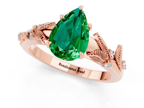 Rose gold Pear Cut Emerald Solitaire Ring with Leaf Motif Band and Four-Prong Setting