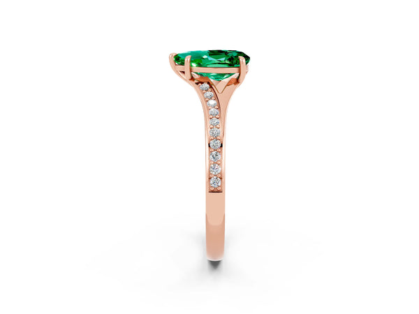 Rose gold Pear Cut Emerald Solitaire Ring with Pavé Band and Prong Setting