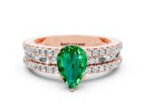 Rose gold Pear Cut Emerald Solitaire Ring with Pavé and Channel Set Band