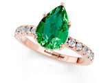 Rose gold Pear Cut Emerald Solitaire Ring with Round  Pavé Band and Four-Prong Setting_45