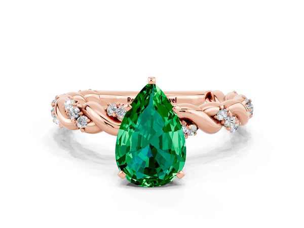Rose gold Pear Cut Emerald Solitaire Ring with Twisted Band and Pavé Accents