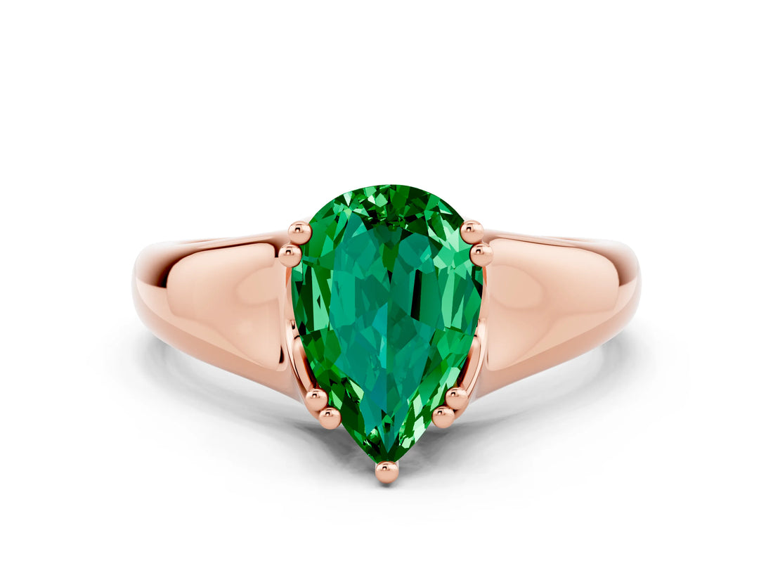 Rose gold Pear Cut Emerald Solitaire Ring with Wide Band and Prong Setting