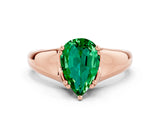 Rose gold Pear Cut Emerald Solitaire Ring with Wide Band and Prong Setting