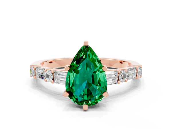 Rose gold Pear Cut Emerald Solitaire with Side Baguettes and Channel Set Band