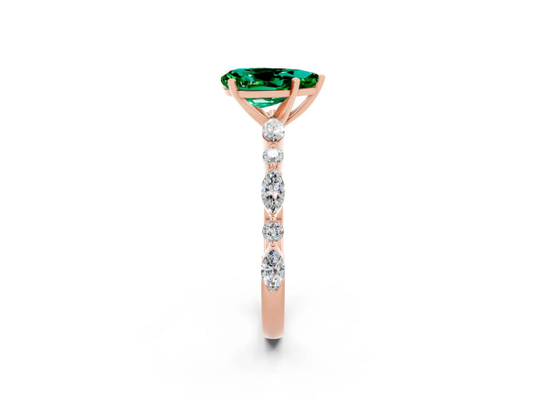 Rose gold Pear Cut Emerald Ring with Marquise and Round  Side Stones and Four-Prong Setting