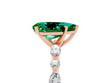 Rose gold Pear Cut Emerald Solitaire with Side Stones on a Pavé Band and Four-Prong Setting_5