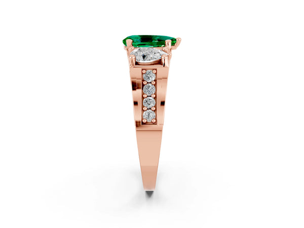 Rose gold Pear Cut Emerald Three-Stone Ring with Channel Set Band and Four-Prong Setting
