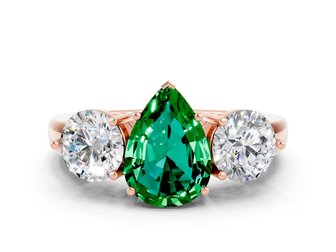 Rose gold Pear Cut Emerald Three-Stone Ring with Prong Setting and Classic Band