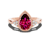 Rose gold Pear Cut Garnet Halo Ring with Tapered Band and Four-Prong Setting