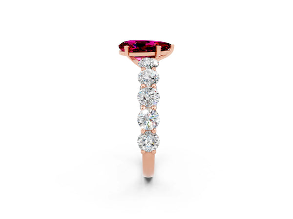 Rose gold Pear Cut Garnet Prong Setting with Side Stones on a Pave Band