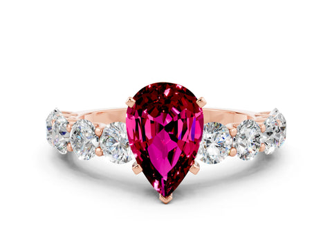 Rose gold Pear Cut Garnet Prong Setting with Side Stones on a Pave Band