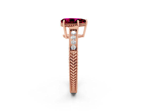 Rose gold Pear Cut Garnet Ring with Milgrain Pavé Band and Four-Prong Setting