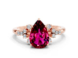Rose gold Pear Cut Garnet Ring with Side Stones and Four-Prong Setting_36