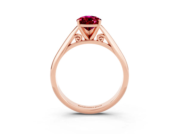 Rose gold Pear Cut Garnet Solitaire Engagement Ring with Cathedral Setting and Four-Prong Mount
