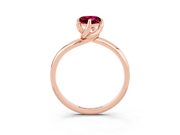 Rose gold Pear Cut Garnet Solitaire Engagement Ring with Four-Prong Setting and Classic Band