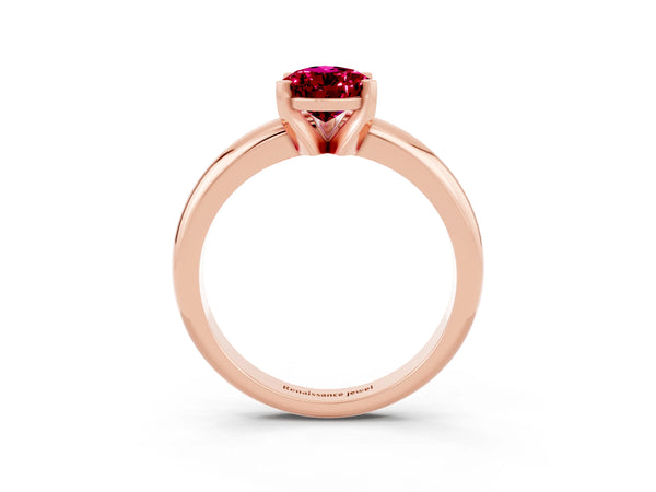 Rose gold Pear Cut Garnet Solitaire Engagement Ring with Round Band and Four-Prong Setting